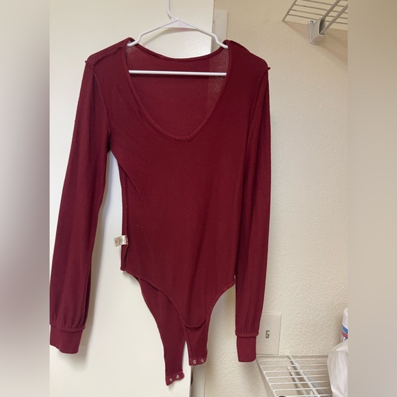 Tops - Deep v cut maroon body suit